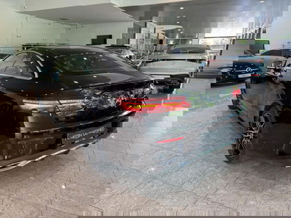 Mercedes E-Class 220 D Coupé AMG Line | Panoramisch Dak | Head-Up Display | 360° Parkeerpakket | Memory Zetels | Dodehoekassistent | Verwarmde Zetels | Smartphone Integratie |