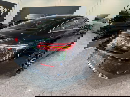 Mercedes E-Class 220 D Coupé AMG Line | Panoramisch Dak | Head-Up Display | 360° Parkeerpakket | Memory Zetels | Dodehoekassistent | Verwarmde Zetels | Smartphone Integratie |